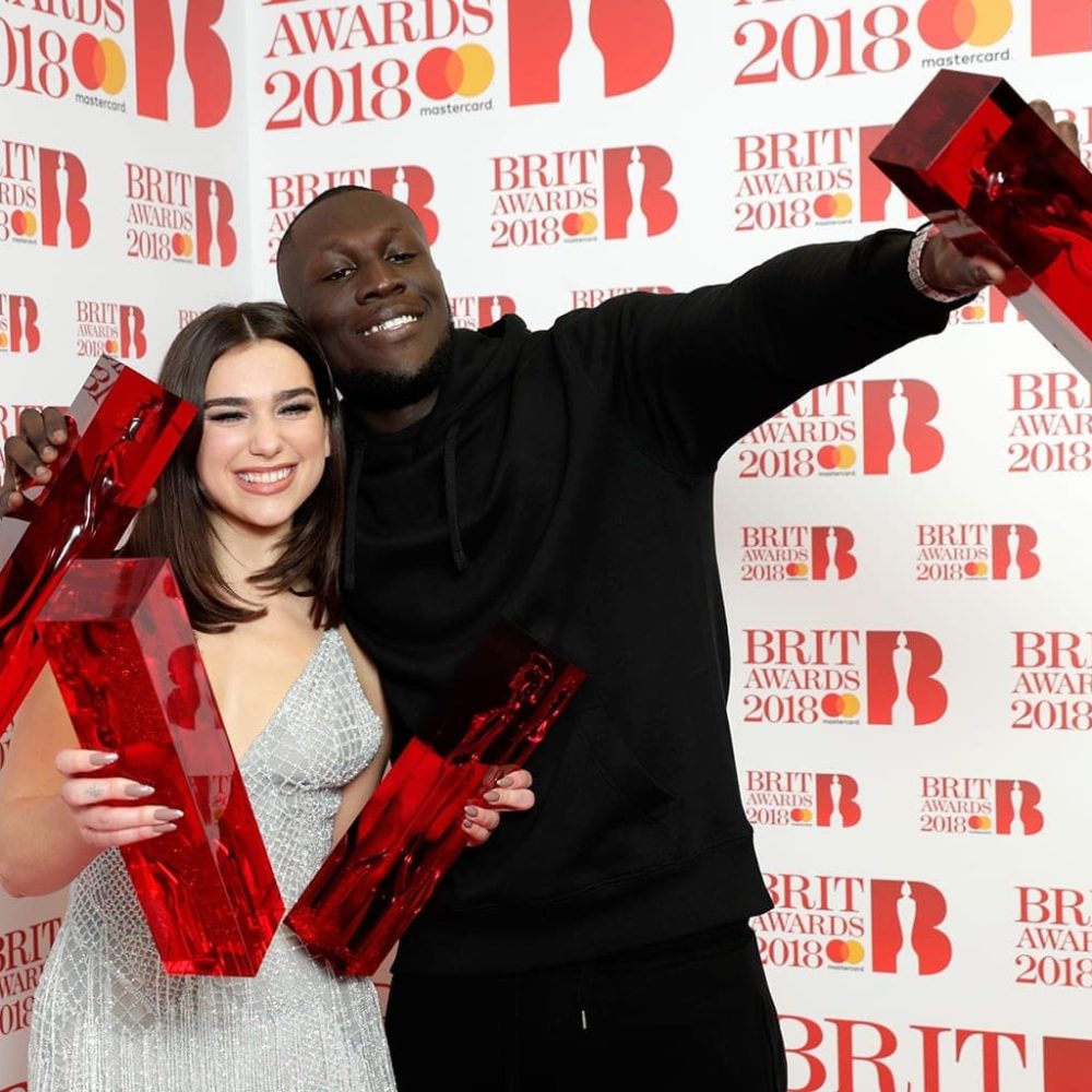 dua-lipa-stormzy-brit-awards-press-room-2018-billboard-1548