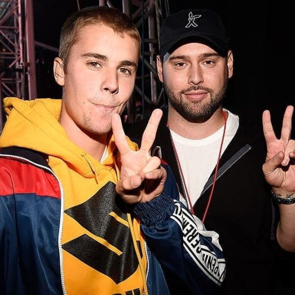 MANCHESTER, ENGLAND - JUNE 04:  Justin Bieber (L) and Scooter Braun backstage during the One Love Manchester Benefit Concert at Old Trafford Cricket Ground on June 4, 2017 in Manchester, England.  (Photo by Kevin Mazur/One Love Manchester/Getty Images for One Love Manchester)